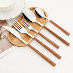 Elegant Cutlery Set with Wood-Inspired Handles for Dining