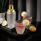 Elegant Glass and Gold Steel Cocktail Shaker for Home Bars