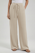 Women’s Flowing Palazzo Trousers with Drawstring Waist and Pockets Beige