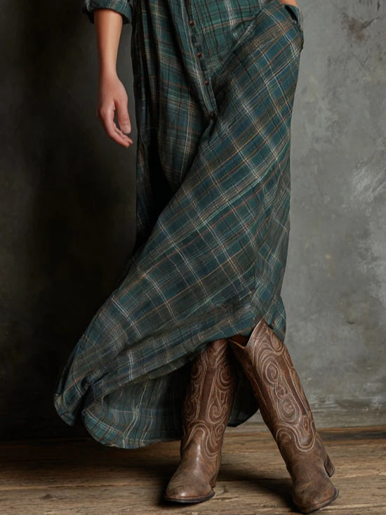 Women's checked dress in green with a structured boho silhouette, styled for casual and smart-casual outfits.