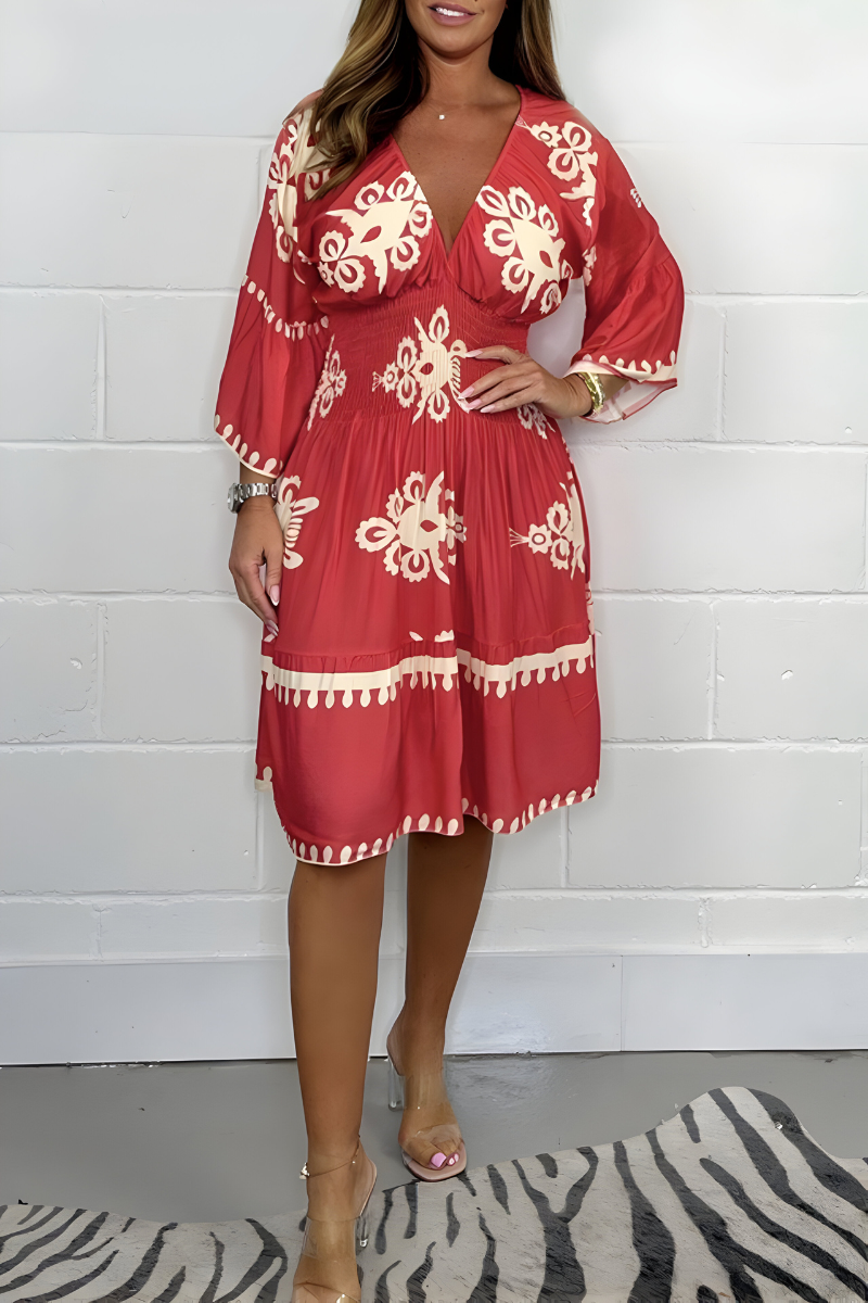 Women's boho dress in red with a flowing skirt, styled for casual and smart-casual outfits.