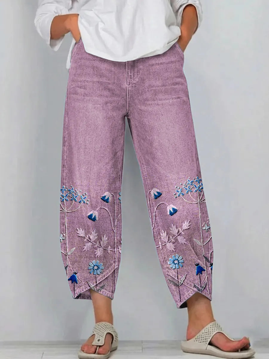 Women's casual trousers in purple with a relaxed fit, styled for casual and smart-casual outfits.
