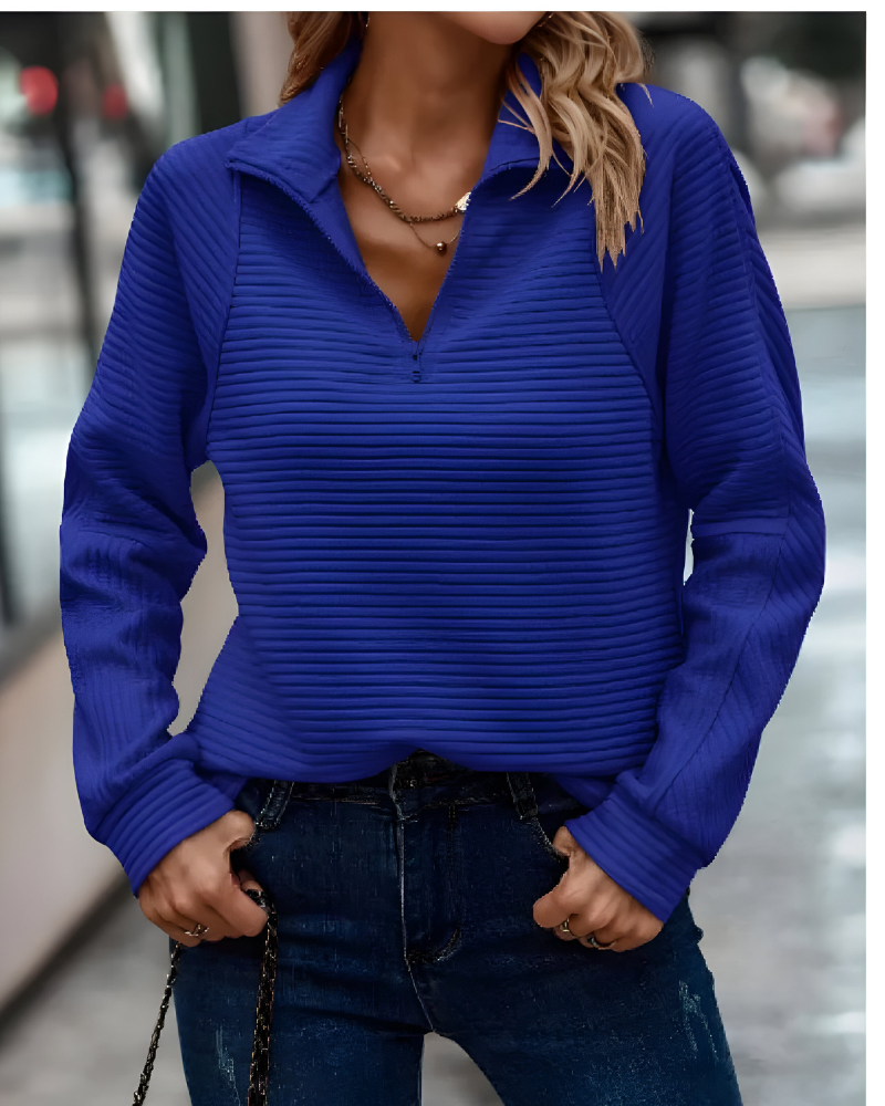 Women's pullover jumper in blue with a modern fit, styled for casual and smart-casual outfits.