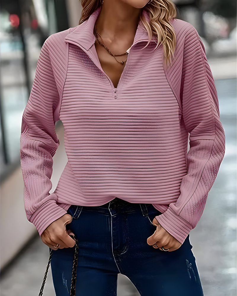 Women's pullover jumper in pink with a modern fit, styled for casual and smart-casual outfits.