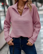 Women's pullover jumper in pink with a modern fit, styled for casual and smart-casual outfits.