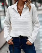 Women's pullover jumper in white with a modern fit, styled for casual and smart-casual outfits.