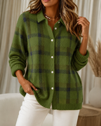 Women's knitted cardigan in green with check pattern, styled for casual and smart-casual outfits.