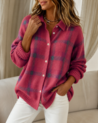 Women's knitted cardigan in pink with check pattern, styled for casual and smart-casual outfits.