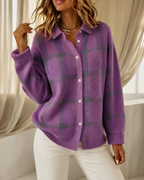 Women's knitted cardigan in purple with check pattern, styled for casual and smart-casual outfits.