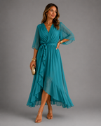 Women's chiffon maxi dress in light blue with wrap front, styled for casual and smart-casual outfits.