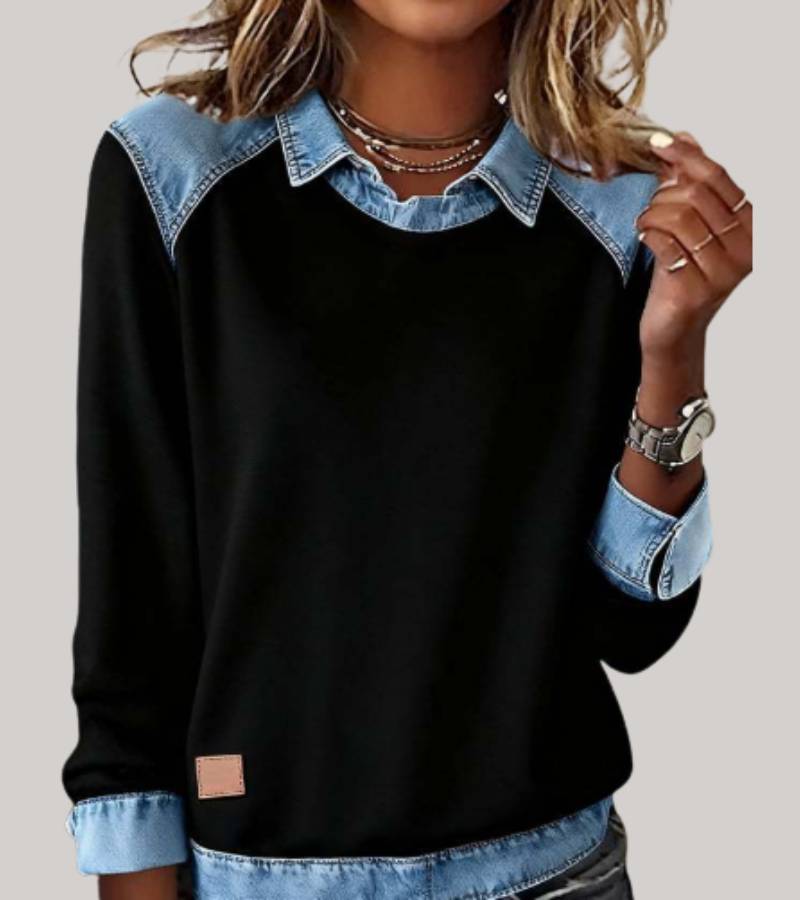 Women's denim-look jumper in black with contrast denim collar, styled for casual and smart-casual outfits.