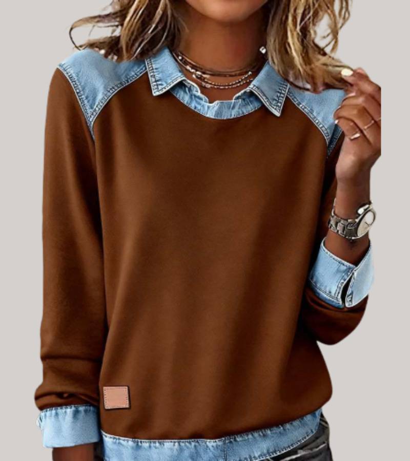 Women's denim-look jumper in brown with contrast denim cuffs, styled for casual and smart-casual outfits.