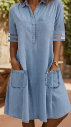 Women's shirt dress in blue with half button placket, styled for casual and smart-casual outfits.