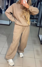 Women's lounge set in apricot with diamond texture, styled for casual and smart-casual outfits.