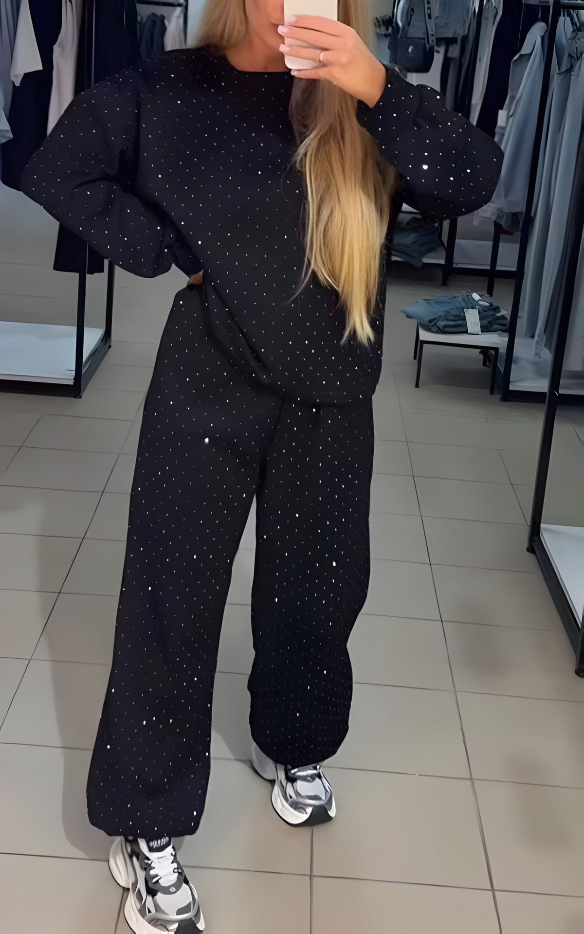 Women's lounge set in black with diamond texture, styled for casual and smart-casual outfits.