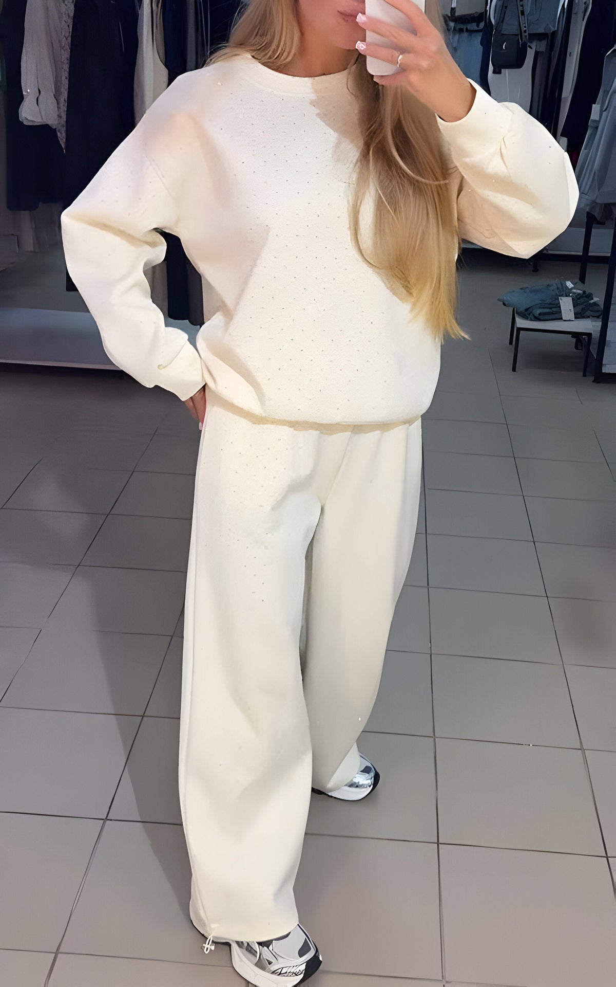 Women's lounge set in white with diamond texture, styled for casual and smart-casual outfits.
