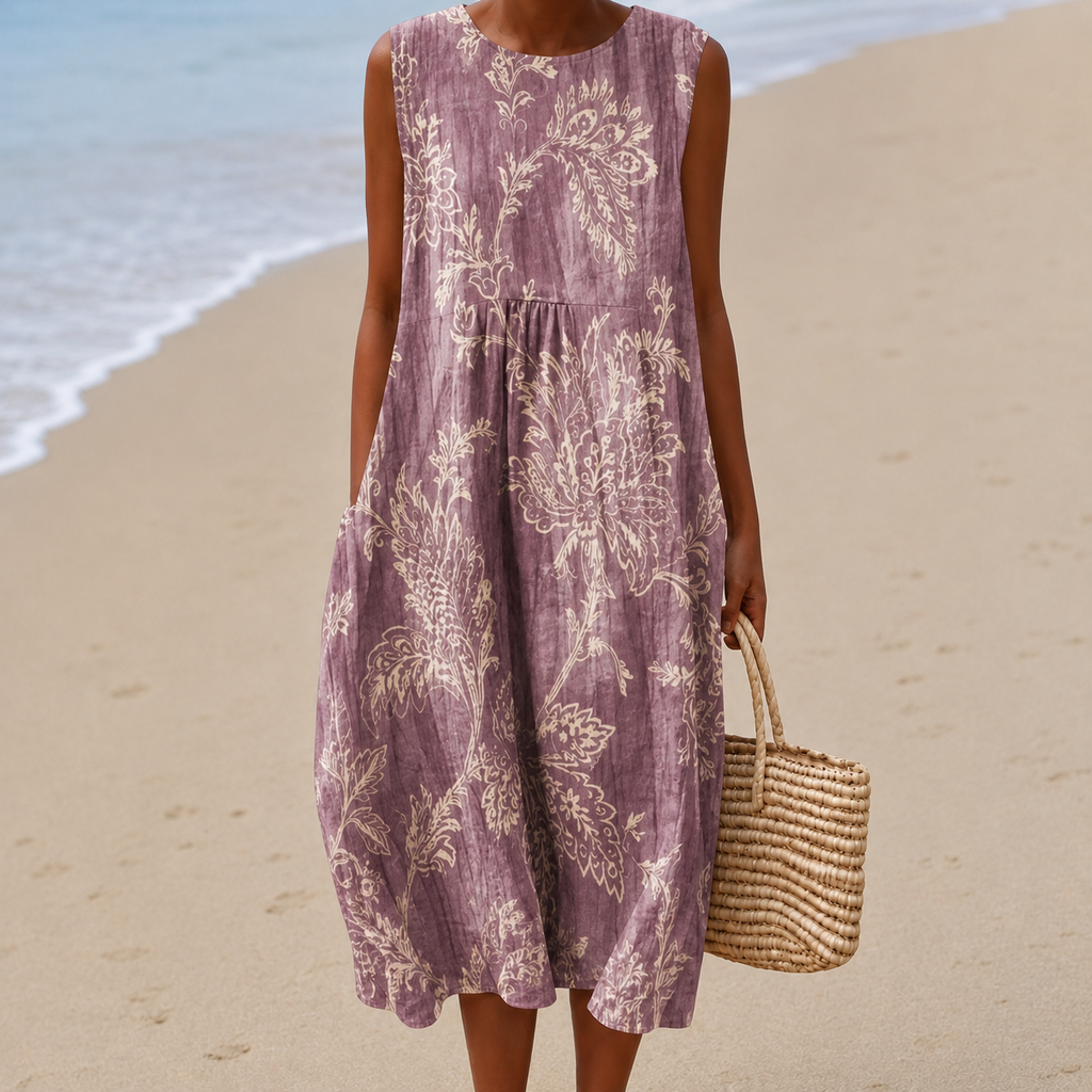 Women's midi dress in mauve with a sleeveless floral design, styled for casual and smart-casual outfits.
