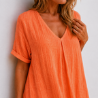 Women's maxi dress in peacock green with V-neckline, styled for casual and smart-casual outfits.