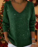 Women's knitted jumper in green with glitter ribbed knit, styled for casual and smart-casual outfits.