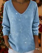 Women's knitted jumper in light blue with glitter ribbed knit, styled for casual and smart-casual outfits.