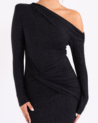 Women's maxi dress in black with a glittering finish, styled for evening and smart-casual outfits.