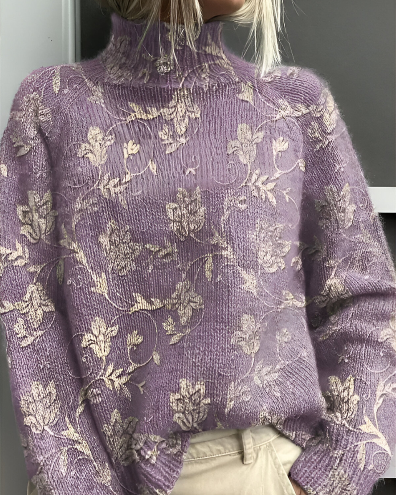 Women's knitted jumper in purple with graphic print, styled for casual and smart-casual outfits.