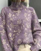 Women's knitted jumper in purple with graphic print, styled for casual and smart-casual outfits.