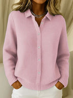 Women's knitted jumper in pink with collar, styled for casual and smart-casual outfits.