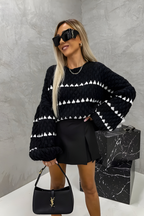 Women's knitted jumper in brown with a timeless pullover design, styled for casual and smart-casual outfits.
