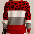 Women's knitted jumper in grey with a modern knit structure, styled for casual and smart-casual outfits.