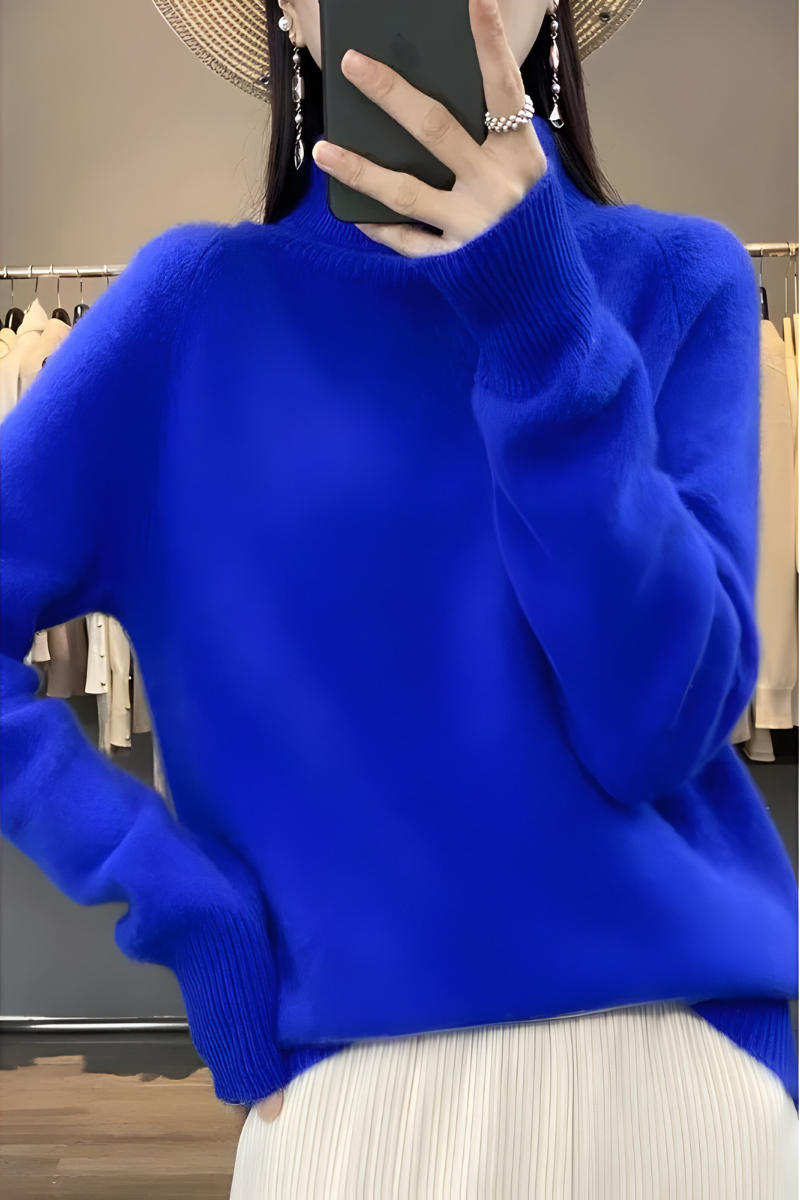 Women’s roll-neck jumper in navy with high knitted collar, styled for casual and smart-casual outfits.