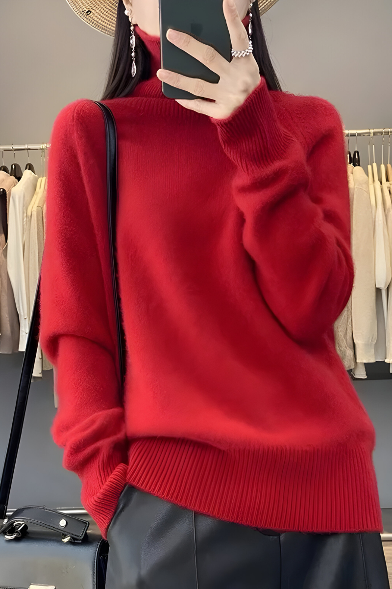 Women’s roll-neck jumper in red with high knitted collar, styled for casual and smart-casual outfits.