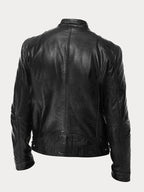 Men's faux leather jacket in black with biker collar, styled for casual and smart-casual outfits.