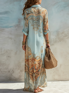 Women's shirt dress in blue with printed maxi skirt, styled for casual and smart-casual outfits.
