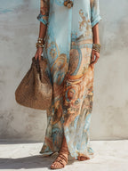 Women's shirt dress in blue with printed maxi skirt, styled for casual and smart-casual outfits.