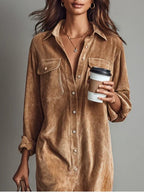 Women's dress in brown with a modern shape-following cut, styled for casual and smart-casual outfits.