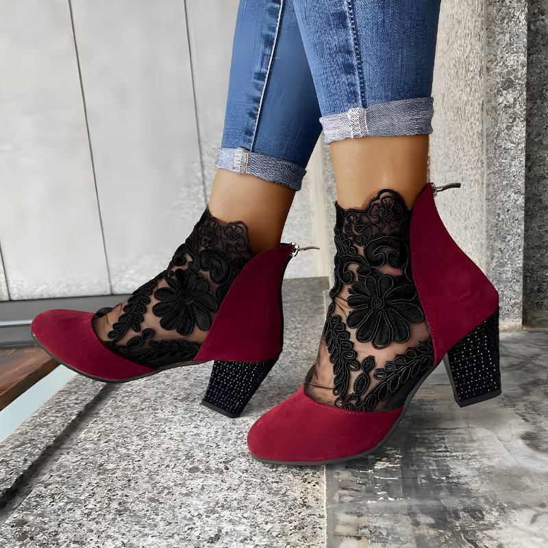 Women's orthopaedic heels in black with a wide toe box, styled for casual and smart-casual outfits.