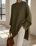 Women's knitted jumper in green with an oversized fit, styled for casual and smart-casual outfits.