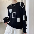 Women's patchwork jumper in white with panelled design, styled for casual and smart-casual outfits.