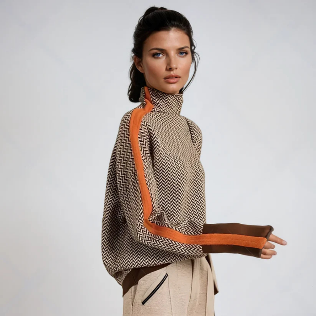 Women's roll-neck jumper in orange with all-over print, styled for casual and smart-casual outfits.