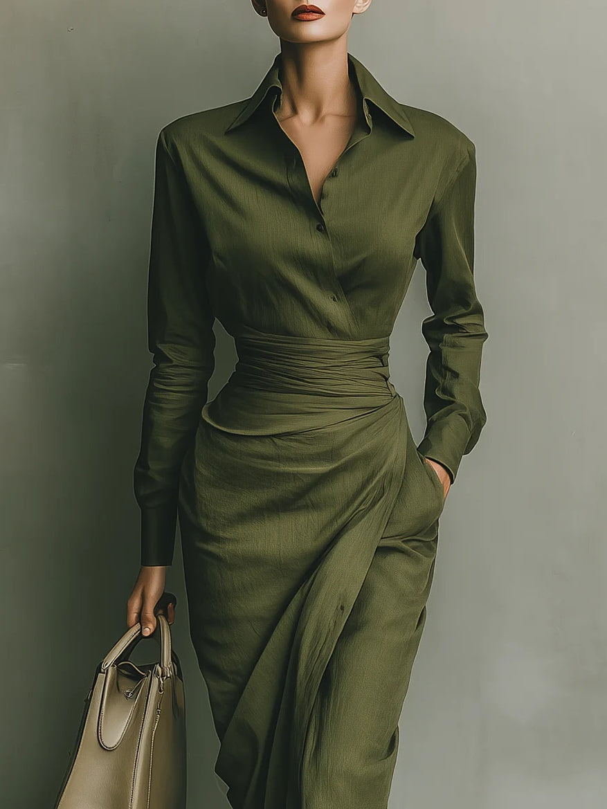 Women's wrap dress in green with a tailored waist, styled for casual and smart-casual outfits.