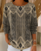 Women's knit jumper in green with textured surface detail, styled for casual and smart-casual outfits.