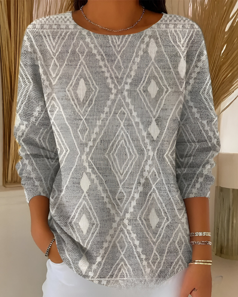 Women's knit jumper in grey with textured surface detail, styled for casual and smart-casual outfits.