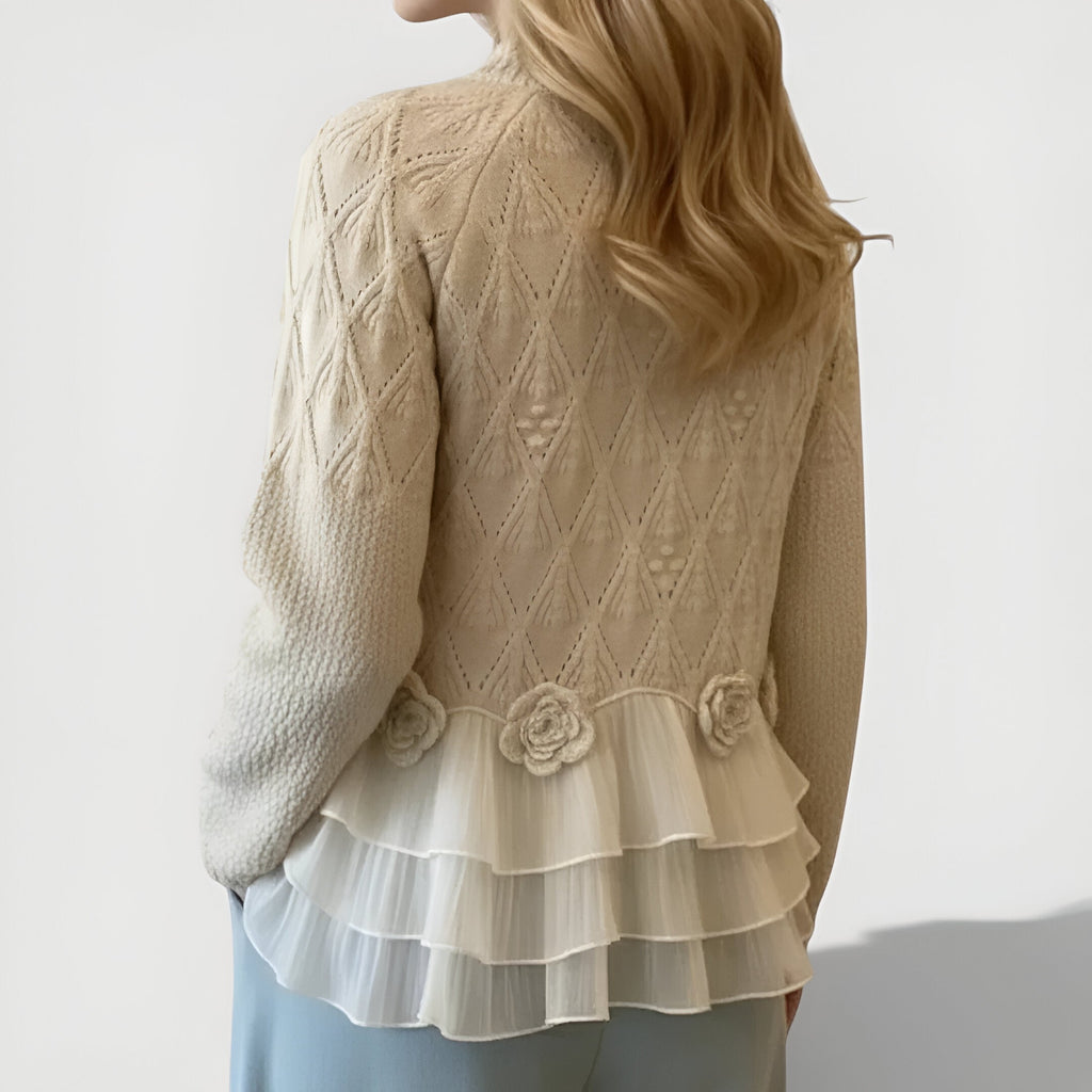 Women's jumper in beige with textured ruffle detailing, styled for casual and smart-casual outfits.