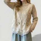 Women's jumper in beige with textured ruffle detailing, styled for casual and smart-casual outfits.