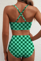 Women's bikini set in green with high-waisted bottoms, styled for beach and poolside outfits.