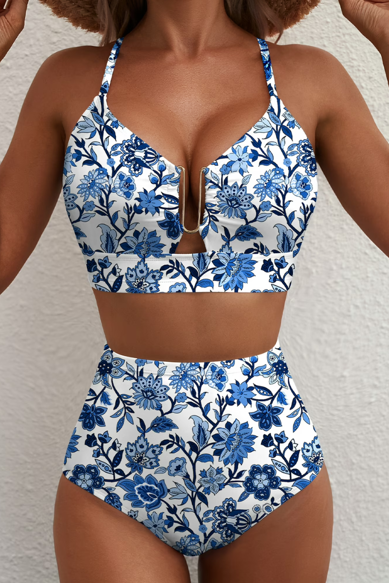 Women's bikini set in blue with high-waisted bottoms, styled for beach and poolside outfits.
