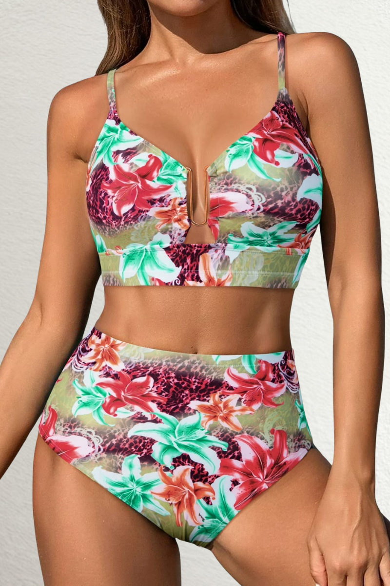 Women's bikini set in a floral print with high-waisted bottoms, styled for beach and poolside outfits.