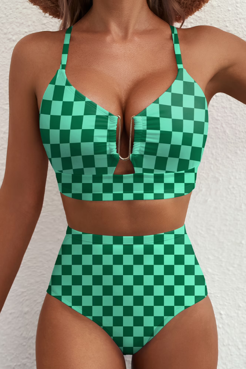 Women's bikini set in green with high-waisted bottoms, styled for beach and poolside outfits.