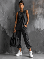 Women's two-piece casual set in grey with sleeveless top, styled for casual and smart-casual outfits.